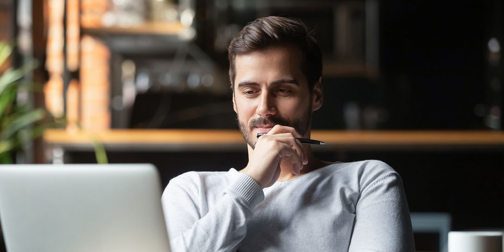 Man thinking at desk